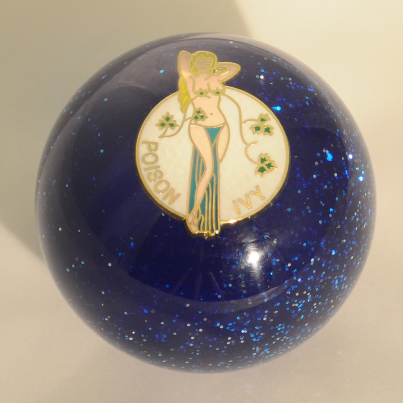 Poison Ivy embedded 2.25 diameter round gear shift knob