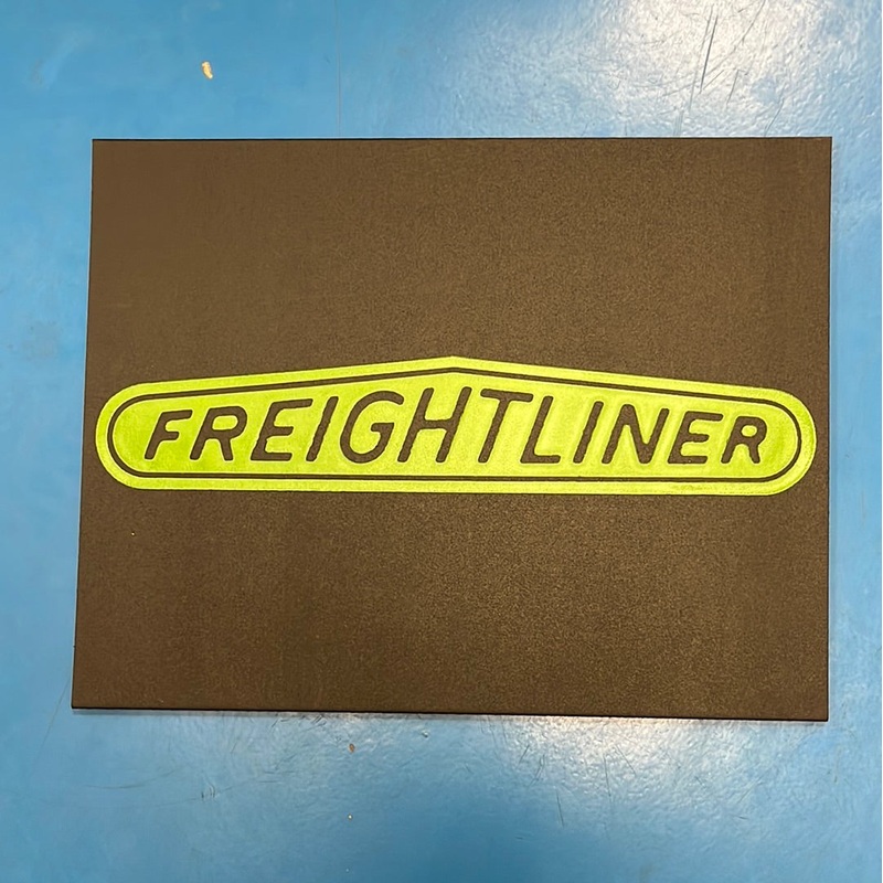 Freightliner 18 x 14 black front fender mudflap w/green stamped logo