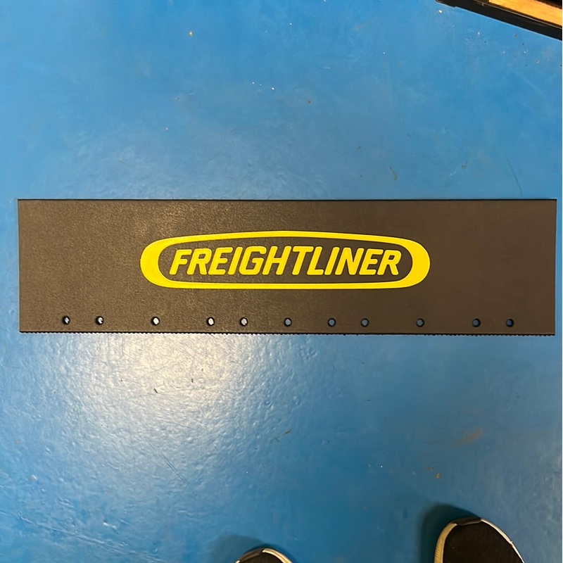 Freightliner 24 x 6 black quarter fender mudflap w/yellow stamped logo