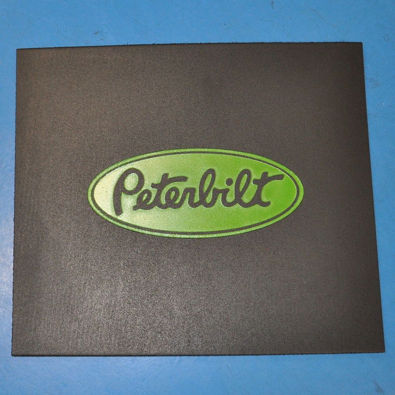 Peterbilt 16 x 14 black front fender mudflap w/green stamped logo