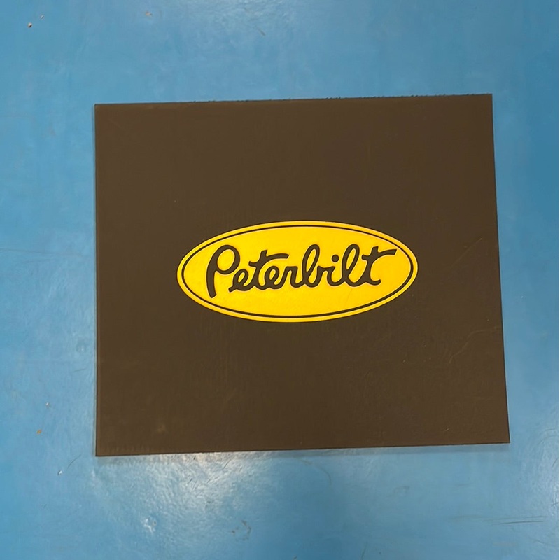 Peterbilt 16 x 14 black front fender mudflap w/yellow stamped logo